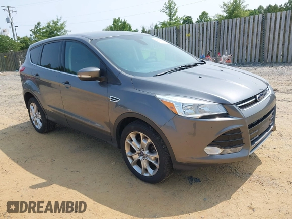 2013 Ford Escape SEL with VIN 1FMCU9H99DUC25469, listed as a IAAI auction lot 42402148 with 99,830 mi miles and . Bid and sale history available at DreamBid. Image 1.