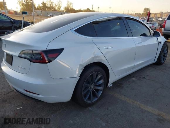 2020 Tesla Model 3 Performance with VIN 5YJ3E1EC1LF602516, listed as a IAAI auction lot 41841216 with 28,967 mi miles and . Bid and sale history available at DreamBid. Image 4.