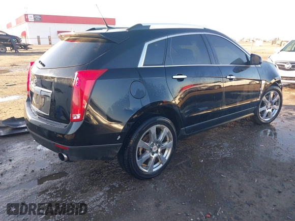 2010 Cadillac SRX Premium Collection with VIN 3GYFNCEY9AS521993, listed as a IAAI auction lot 41154875 with 219,713 mi miles. Bid and sale history available at carsss.com. Image 4.