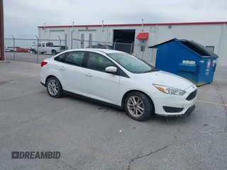 2015 Ford Focus SE with VIN 1FADP3F23FL255584, listed as a IAAI auction lot 41990636 with 151,389 mi miles. Bid and sale history available at carsss.com. Image 1.