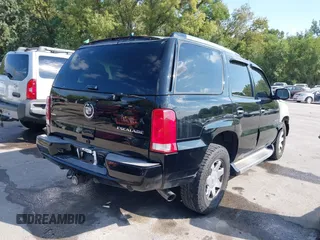 2005 Cadillac Escalade z VIN 1GYEK63N25R105839, wystawiony jako IAAI lot #40391246 z przebiegiem Nie podano mil oraz . Historia ofert i sprzedaży dostępna na DreamBid. Obrazek 4.