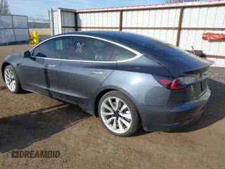 2020 Tesla Model 3 Long Range with VIN 5YJ3E1EB3LF801834, listed as a IAAI auction lot 42015079 with 47,793 mi miles. Bid and sale history available at carsss.com. Image 3.