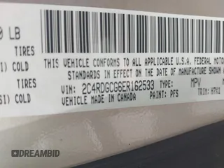 2014 Dodge Grand Caravan SXT z VIN 2C4RDGCG6ER162533, wystawiony jako IAAI lot #42251591 z przebiegiem 70 666 mil mil oraz . Historia ofert i sprzedaży dostępna na DreamBid. Obrazek 9.