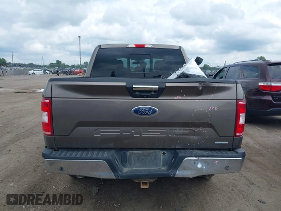 2020 Ford F-150 XL with VIN 1FTEW1EP1LFC03447, listed as a IAAI auction lot 42626026 with 111,525 mi miles and . Bid and sale history available at DreamBid. Image 16.