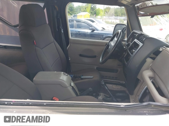 2005 Jeep Wrangler Unlimited with VIN 1J4FA44S65P368475, listed as a IAAI auction lot 42484636 with Not provided miles and . Bid and sale history available at DreamBid. Image 5.