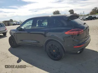 2017 Porsche Cayenne Turbo with VIN WP1AC2A2XHLA92055, listed as a Copart auction lot 52610555 with 82,224 mi miles and Salvage title. Bid and sale history available at DreamBid. Image 2.