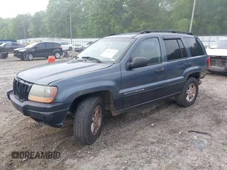 2002 Jeep Grand Cherokee Laredo z VIN 1J4GX48S62C201579, wystawiony jako IAAI lot #42102238 z przebiegiem 262 630 mil mil oraz . Historia ofert i sprzedaży dostępna na DreamBid. Obrazek 2.