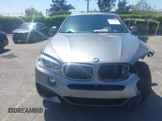 2018 BMW X6 xDrive35i z VIN 5UXKU2C51J0X50913, wystawiony jako IAAI lot #42078443 z przebiegiem Nie podano mil oraz . Historia ofert i sprzedaży dostępna na DreamBid. Obrazek 11.