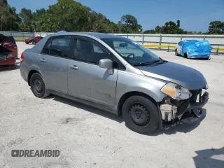 2009 Nissan Versa S with VIN 3N1BC11EX9L444814, listed as a Copart auction lot 59732395 with 188,471 mi miles and Salvage title. Bid and sale history available at DreamBid. Image 4.