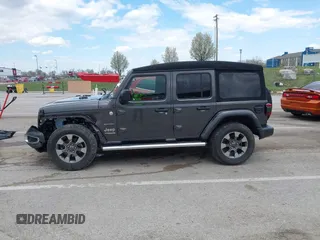 2019 Jeep Wrangler Unlimited Sahara with VIN 1C4HJXEN3KW622167, listed as a IAAI auction lot 41880702 with 72,928 mi miles and . Bid and sale history available at DreamBid. Image 15.