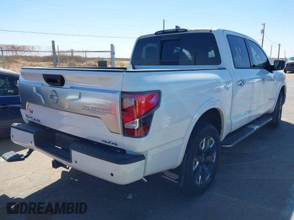 2024 Nissan Titan Pro-4X with VIN 1N6AA1ED3RN104028, listed as a IAAI auction lot 41837183 with 12,267 mi miles and . Bid and sale history available at DreamBid. Image 4.