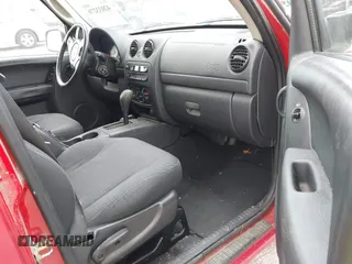 2003 Jeep Liberty Sport with VIN 1J4GL48K03W608325, listed as a IAAI auction lot 42033270 with 210,609 mi miles. Bid and sale history available at carsss.com. Image 5.