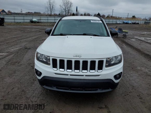 2014 Jeep Compass Sport with VIN 1C4NJDBB9ED641754, listed as a Copart auction lot 52806165 with 76,100 mi miles and Clean Title. Bid and sale history available at carsss.com. Image 5.