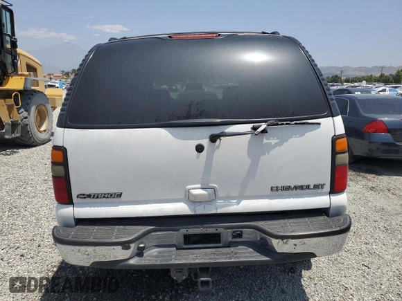 2004 Chevrolet Tahoe LS z VIN 1GNEC13T94R165160, wystawiony jako Copart lot #59994985 z przebiegiem 303 473 mil mil oraz Szkoda całkowita • Salvage title. Historia ofert i sprzedaży dostępna na DreamBid. Obrazek 6.