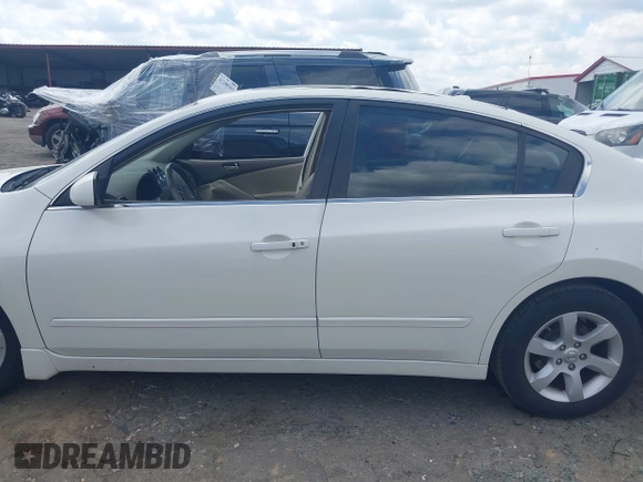 2009 Nissan Altima S z VIN 1N4AL21E39N471549, wystawiony jako IAAI lot #42203365 z przebiegiem 197 775 mil mil oraz . Historia ofert i sprzedaży dostępna na DreamBid. Obrazek 14.