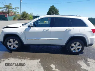 2011 Jeep Grand Cherokee Laredo with VIN 1J4RR4GG3BC736370, listed as a IAAI auction lot 42053862 with 169,269 mi miles and . Bid and sale history available at DreamBid. Image 14.