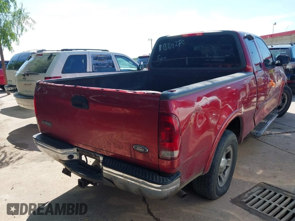 2002 Ford F-150 XL with VIN 1FTRX17W02KB40270, listed as a IAAI auction lot 42573017 with Not provided miles and . Bid and sale history available at DreamBid. Image 4.