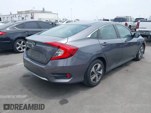2020 Honda Civic LX z VIN 2HGFC2F60LH596396, wystawiony jako IAAI lot #42354812 z przebiegiem 62 082 mil mil oraz . Historia ofert i sprzedaży dostępna na DreamBid. Obrazek 4.