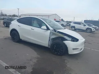 2023 Tesla Model Y Long Range with VIN 7SAYGDEE6PF808183, listed as a IAAI auction lot 41722935 with 31,408 mi miles and . Bid and sale history available at DreamBid. Image 1.