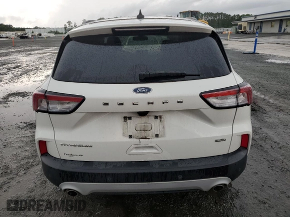 2020 Ford Escape Titanium Hybrid с VIN 1FMCU0DZ7LUA84837, выставлен на аукционе Copart как лот 59442955 с пробегом 53 258 миль миль и Списание • Salvage title. История ставок и продаж доступна на DreamBid. Изображение 6.