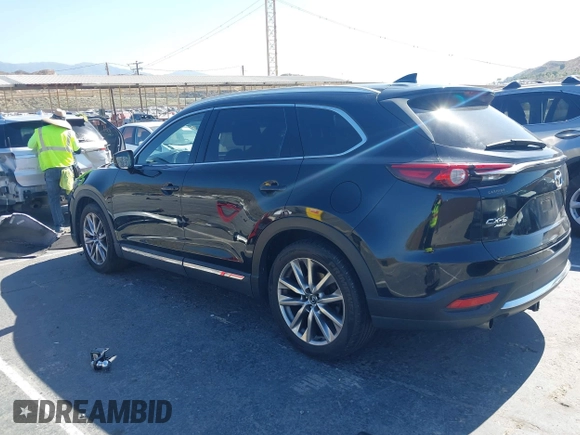 2017 Mazda CX-9 Grand Touring with VIN JM3TCBDY0H0130671, listed as a IAAI auction lot 42514237 with 81,016 mi miles and . Bid and sale history available at DreamBid. Image 3.