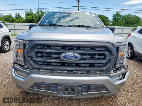 2023 Ford F-150 XL with VIN 1FTEW1C57PFC27842, listed as a Copart auction lot 59906015 with 43,495 mi miles and Salvage title. Bid and sale history available at DreamBid. Image 5.