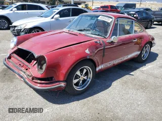 1969 Porsche 911 with VIN 119200792, listed as a Copart auction lot 49263235 with 9,446 mi miles and Salvage title. Bid and sale history available at DreamBid. Image 1.