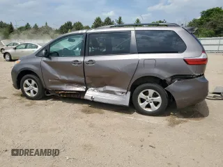 2016 Toyota Sienna LE AAS с VIN 5TDKK3DC7GS763990, выставлен на аукционе Copart как лот 57080655 с пробегом 74 036 миль миль и Списание • Salvage title. История ставок и продаж доступна на DreamBid. Изображение 2.