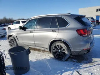 2018 BMW X5 xDrive40e iPerformance with VIN 5UXKT0C52J0W03927, listed as a Copart auction lot 88252805 with 165,331 mi miles and Clean Title. Bid and sale history available at carsss.com. Image 2.