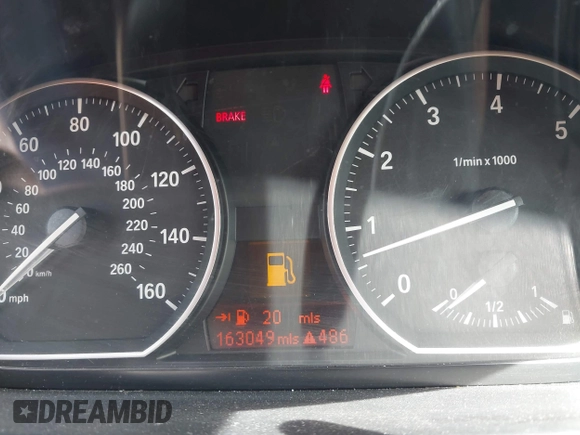 2011 BMW 1 Series 128i with VIN WBAUL7C5XBVE87044, listed as a IAAI auction lot 42095602 with 163,049 mi miles and . Bid and sale history available at carsss.com. Image 7.