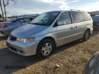 2001 Honda Odyssey EX z VIN 2HKRL18601H565673, wystawiony jako Copart lot #46644565 z przebiegiem 155 175 mil mil oraz Szkoda całkowita • Salvage title. Historia ofert i sprzedaży dostępna na DreamBid. Obrazek 1.