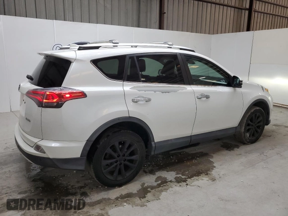 2016 Toyota RAV4 Limited with VIN 2T3YFREV3GW293988, listed as a Copart auction lot 58768425 with 140,214 mi miles and Clean title. Bid and sale history available at DreamBid. Image 3.