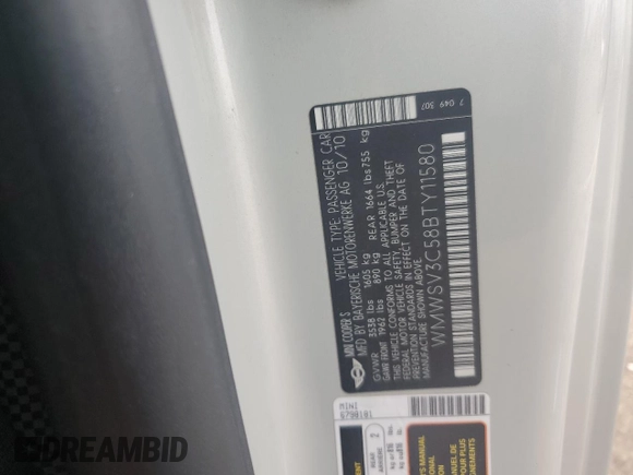 2011 MINI Hardtop S with VIN WMWSV3C58BTY11580, listed as a Copart auction lot 62081615 with 112,336 mi miles and Salvage title. Bid and sale history available at DreamBid. Image 12.