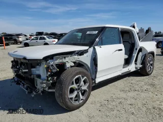 2024 Rivian R1T Adventure z VIN 7FCTGCAA9RN030318, wystawiony jako Copart lot #77036474 z przebiegiem 3522 mil mil oraz Szkody całkowita. Historia ofert i sprzedaży dostępna na DreamBid. Obrazek 1.