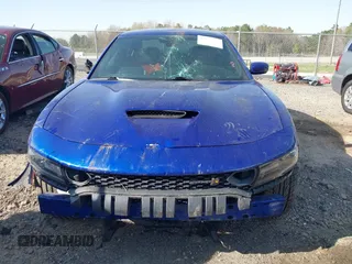 2020 Dodge Charger Scat Pack z VIN 2C3CDXGJ4LH157432, wystawiony jako IAAI lot #41872478 z przebiegiem 65 640 mil mil oraz . Historia ofert i sprzedaży dostępna na DreamBid. Obrazek 13.