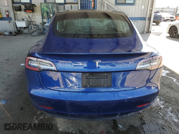 2020 Tesla Model 3 Standard Range Plus with VIN 5YJ3E1EA7LF705907, listed as a Copart auction lot 48765145 with 104,479 mi miles and Salvage Title. Bid and sale history available at DreamBid. Image 6.