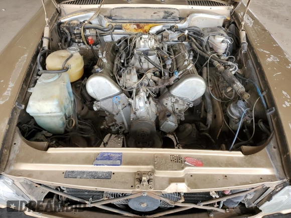 1983 Mercedes-Benz 380 SL z VIN WDBBA45A9DB027768, wystawiony jako Copart lot #49116105 z przebiegiem 154 332 mil mil oraz Czysty tytuł • Clean title. Historia ofert i sprzedaży dostępna na DreamBid. Obrazek 11.