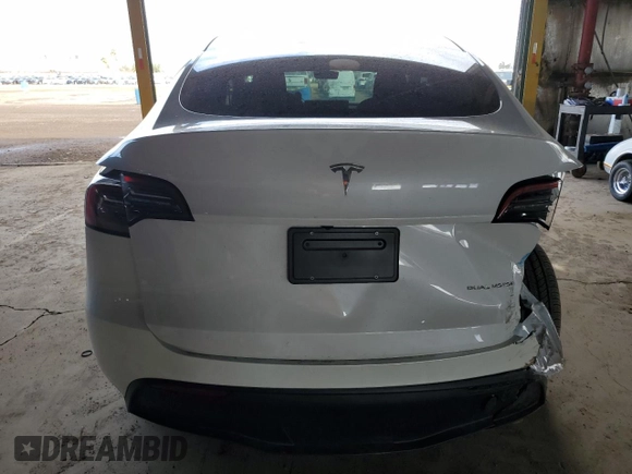 2024 Tesla Model Y Long Range with VIN 7SAYGDEE1RF165311, listed as a Copart auction lot 51711665 with 15,190 mi miles and Salvage Title. Bid and sale history available at DreamBid. Image 6.