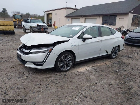 2021 Honda Clarity Plug-In Hybrid Touring with VIN JHMZC5F37MC001310, listed as a IAAI auction lot 40843648 with 166,619 mi miles. Bid and sale history available at carsss.com. Image 2.