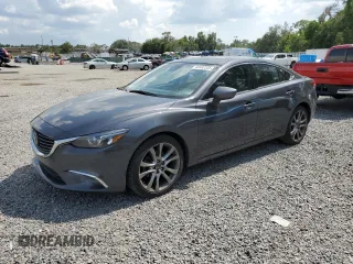 2016 Mazda 6 i Grand Touring с VIN JM1GJ1W50G1447873, выставлен на аукционе Copart как лот 60492335 с пробегом 120 800 миль миль и Чистый • Clean title. История ставок и продаж доступна на DreamBid. Изображение 1.