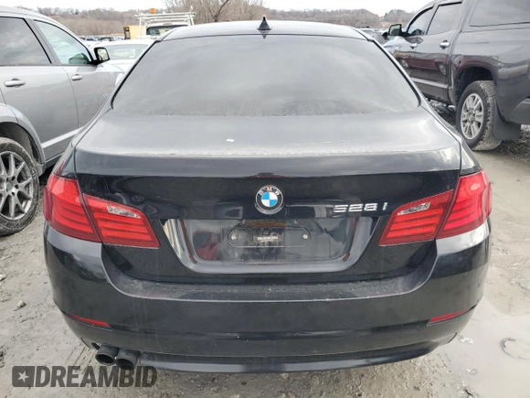 2012 BMW 5 Series 528i xDrive with VIN WBAXH5C55CC595066, listed as a Copart auction lot 46647335 with 124,330 mi miles and Salvage Title. Bid and sale history available at DreamBid. Image 6.