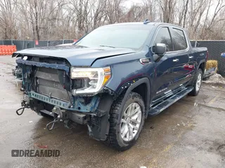 2021 GMC Sierra 1500 SLT z VIN 3GTU9DEL0MG262362, wystawiony jako IAAI lot #41433392 z przebiegiem 69 713 mil mil oraz . Historia ofert i sprzedaży dostępna na DreamBid. Obrazek 2.