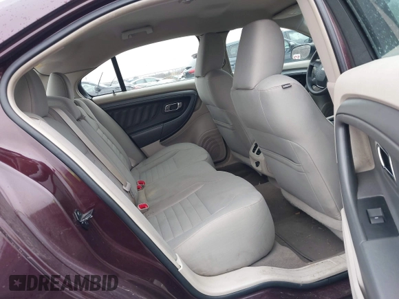 2011 Ford Taurus SE with VIN 1FAHP2DW7BG136988, listed as a IAAI auction lot 42002512 with 145,847 mi miles. Bid and sale history available at carsss.com. Image 8.