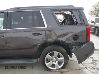 2015 Chevrolet Tahoe LT with VIN 1GNSCBKC5FR504459, listed as a IAAI auction lot 41689405 with 141,783 mi miles and . Bid and sale history available at DreamBid. Image 16.