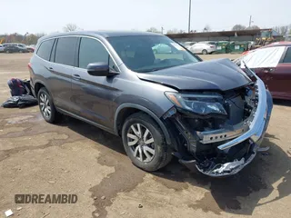 2019 Honda Pilot EX-L z VIN 5FNYF6H55KB082929, wystawiony jako IAAI lot #42057611 z przebiegiem 93 532 mil mil oraz . Historia ofert i sprzedaży dostępna na DreamBid. Obrazek 1.