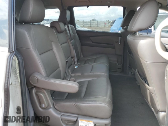 2014 Honda Odyssey Touring with VIN 5FNRL5H97EB097771, listed as a Copart auction lot 51664455 with 109,830 mi miles and Salvage Title. Bid and sale history available at DreamBid. Image 11.