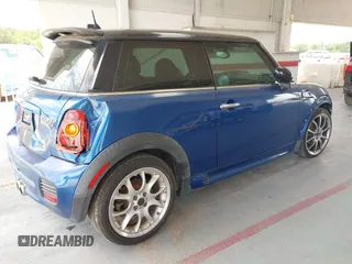 2007 MINI Hardtop S with VIN WMWMF73557TT86128, listed as a IAAI auction lot 42417311 with 114,911 mi miles and . Bid and sale history available at DreamBid. Image 4.