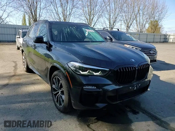 2021 BMW X5 xDrive45e with VIN 5UXTA6C0XM9E92063, listed as a Copart auction lot 54070165 with 14,725 mi miles and Salvage Title. Bid and sale history available at DreamBid. Image 14.