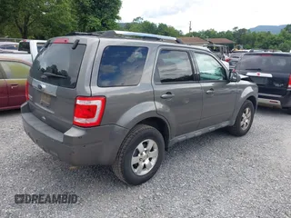 2011 Ford Escape Limited with VIN 1FMCU0E7XBKC69410, listed as a IAAI auction lot 42458547 with 126,022 mi miles and . Bid and sale history available at DreamBid. Image 4.