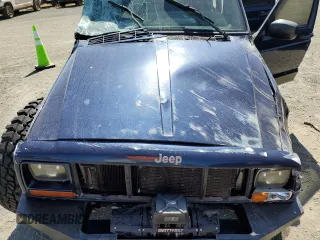 2000 Jeep Cherokee with VIN 1J4FF48S3YL126931, listed as a Copart auction lot 57593305 with Not provided miles and Non repairable. Bid and sale history available at DreamBid. Image 11.